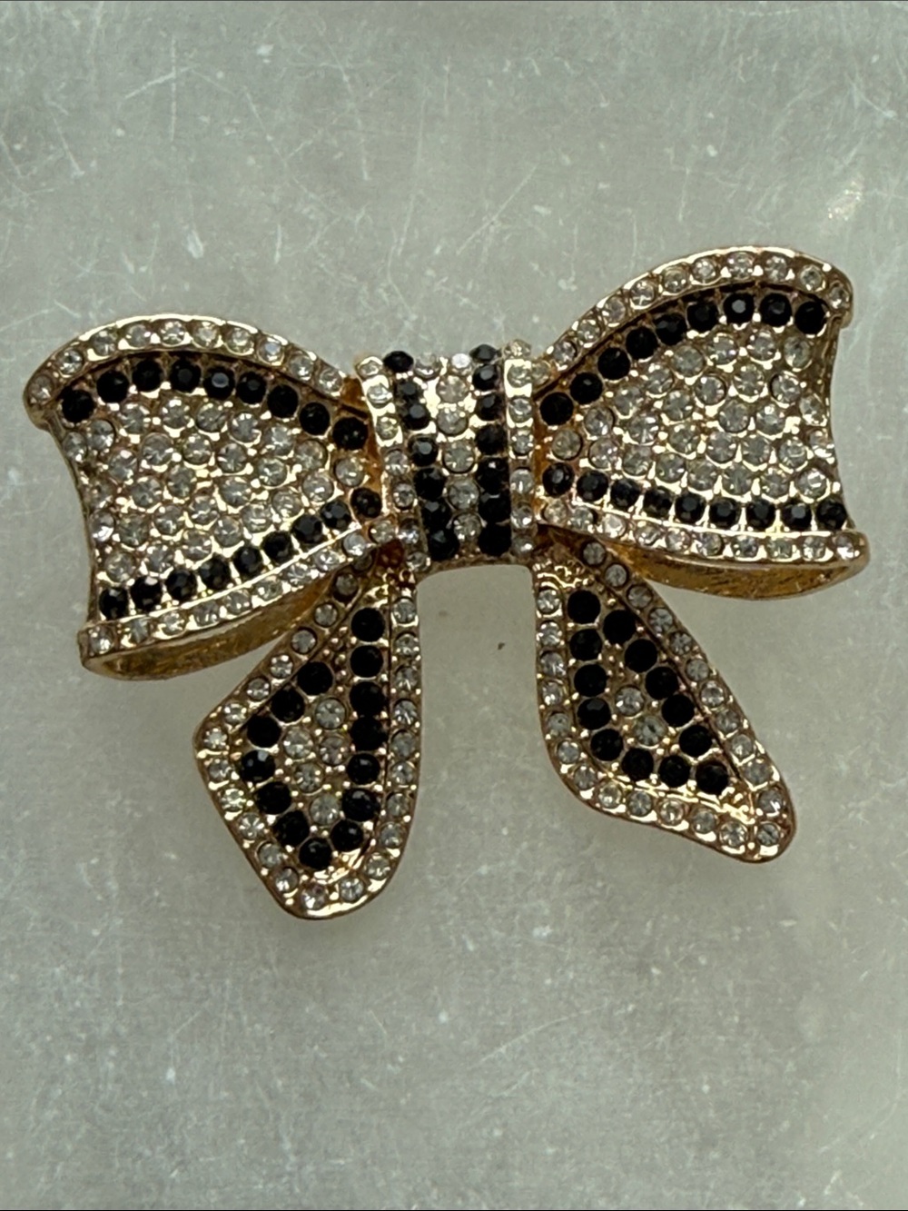 Gold Bow Crystal Brooch in Black and Clear rhinestones